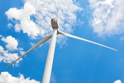 The wind generator is in bright cloudy sky. Eco energy concept. Foto stock
