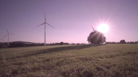Wind generator farm at sunset Video stock 65234879