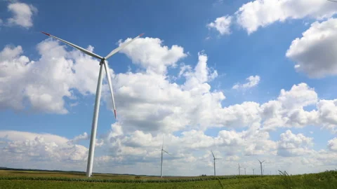 Wind generator farm time lapse with moving clouds Stock Footage 137718211