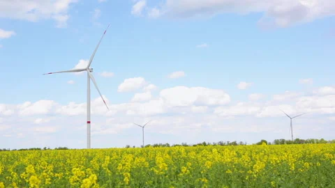 Wind generator for generating electricity in the field Stock Footage 154184326