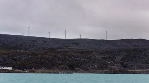Wind generator on the mountain through the clouds, timelapse Stock Footage 8519982