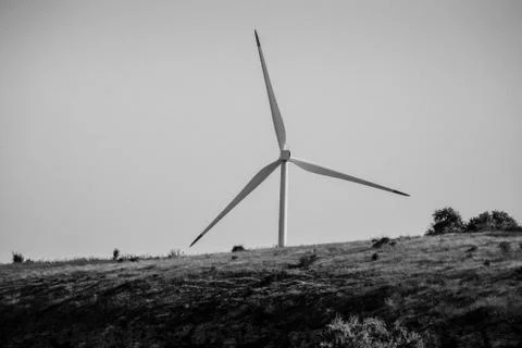 Wind generator over the hill Stock Photos