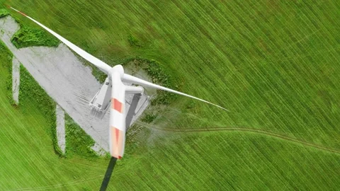 Wind generator turbine in the green fields Stock Footage 163703922