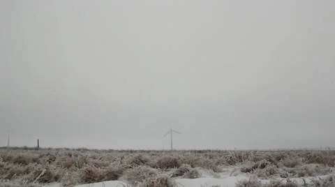 Wind generator in the winter prairie Stock Footage 45491535