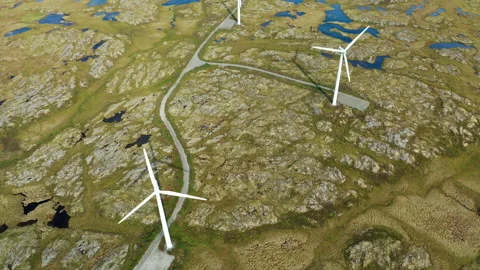 Wind generators in the arctic tundra. Norway, the island of Smola. Aerial view Vídeo Stock 131371924