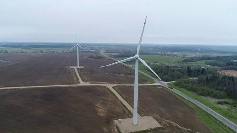 Wind generators are located in the field, aerial photography in bird's eye view, Stock Footage 80264791