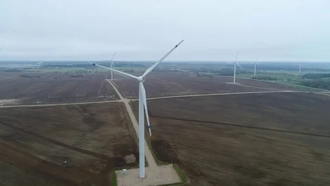Wind generators are located in the field, aerial photography in bird's eye view, Stock Footage 80265677
