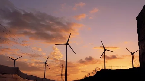 Wind generators with a beautfill sunset. Stock Footage 97464551