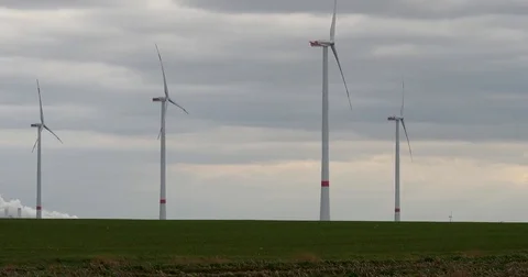 Wind generators instead of Brown coal power station in Germany - UHD 4K Stock Footage 82661826