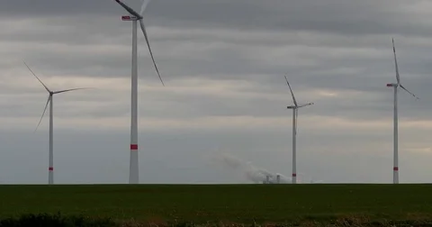 Wind generators instead of Brown coal power station in Germany - UHD 4K Stock Footage 82661828