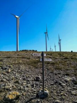 Wind generators on the mountain with blue sky Foto stock