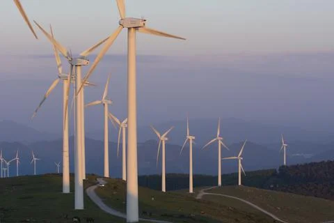 Wind generators in the mountains at sunset Foto stock