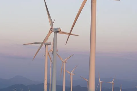 Wind generators in the mountains at sunset Stock Photos