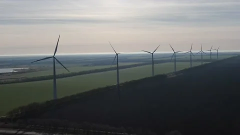 Wind generators over spring fields Stock Footage 169212043