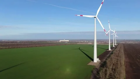 Wind generators over spring fields Stock Footage 169212052
