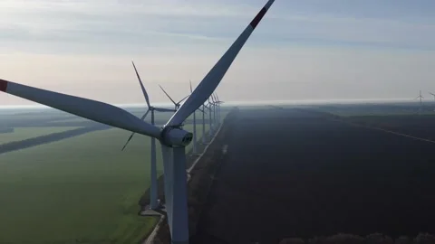 Wind generators over spring fields Stock Footage 169212171
