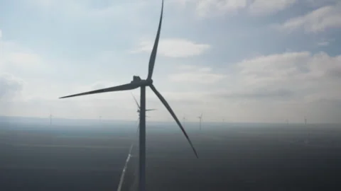 Wind generators in the plain Stock Footage 260606580
