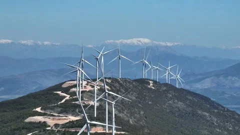 Wind generators spinning on the ridge in mountains Stock Footage 240213685