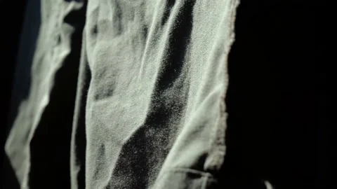 Wind gently moves the drying green jeans Stock Footage 138256387