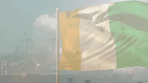 Wind gusts lifting vertical tricolor flag, fabric billowing rightward, showing Stock Footage 332275384