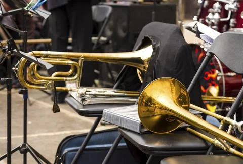 Wind instruments. Hands on musical instruments. Musicians play pipes.  Hand.. Stock Photos