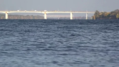 The wind, a light breeze on the Dnepr River. Bridge on the horizon. Stock Footage 70011391