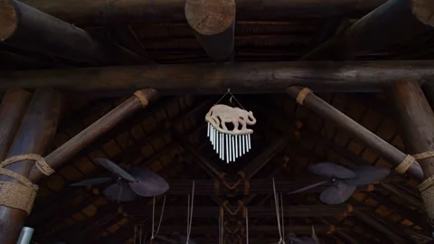 Wind melody on the ceiling of the hut Stock Footage 275006957