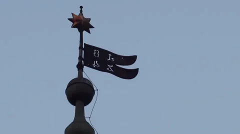 Wind metal flag with 1824 written on it profiled against a blue sky Stock Footage 60056952