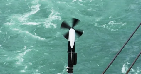 Wind Meter Fan Blowing in the Wind with River, 4K Stock Footage 73926785