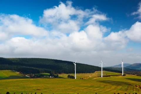 Wind-mill electric generating plants in mountain Stock Photos