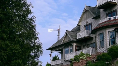 Wind mill over house Video stock 76167684