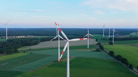 Wind mill for renewable electric energy production. Windmill in a rural area Stock Footage 341005725