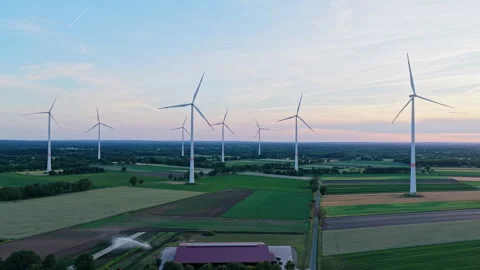Wind mill for renewable electric energy production. Windmill in a rural area Stock Footage 341024224