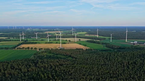 Wind mill for renewable electric energy production. Windmill in a rural area Stock Footage 345364501