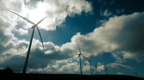 Wind mill turbines on mountain timelapse with cloudy sky Stock Footage 49971084