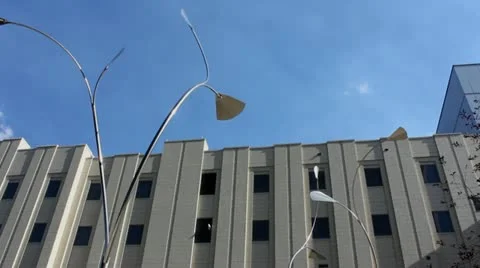Wind mills and a building Video stock 11284870
