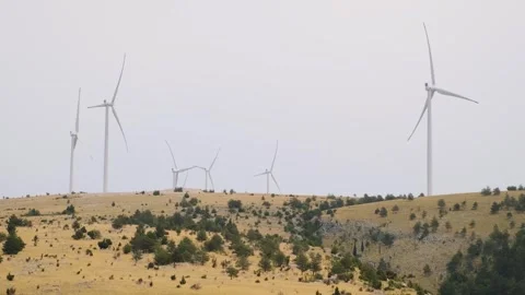 Wind mills on wind farm in Mostar, Bosnia and Herzegovina. Green energy Stock Footage 279644638