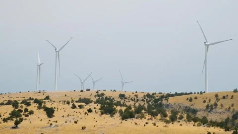 Wind mills on wind power station in Mostar, Bosnia and Herzegovina. Green energy Stock Footage 249042779