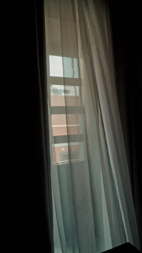 Wind moves curtain in a balcony medium shot vertical Stock Footage 339843097