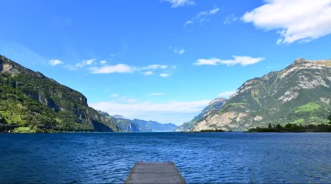 Wind over lake and mountains. Clouds. Stock Footage 64992310
