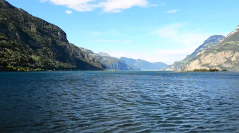 Wind over lake and mountains. Clouds. Stock Footage 64992323