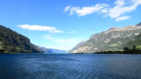 Wind over lake and mountains. Clouds. Stock Footage 64992355