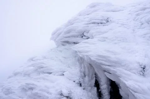 Wind painted Snow Texture Pattern on stone Background, Winter background. Stock Photos
