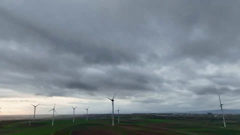Wind park and dramatic sky at dusk Видео 221092244