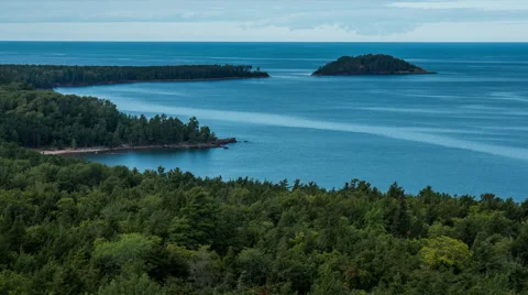 Wind patterns along the lake shore and island Stock Footage 43890465