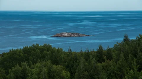 Wind patterns in the lake around an island Stock Footage 43887109