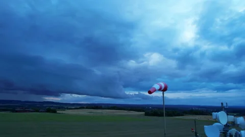 The wind pointer flutters in the wind, showing the direction and speed of the Video stock 167190596