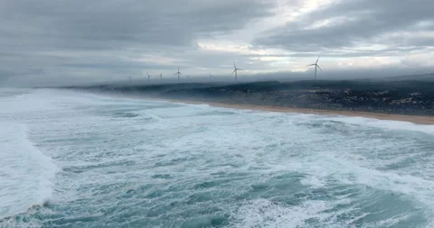 Wind power farm generators at the Atlantic ocean coastline. Alternative Stock Footage 223008999