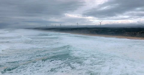 Wind power farm generators at the Atlantic ocean coastline. Alternative Stock Footage 223426064