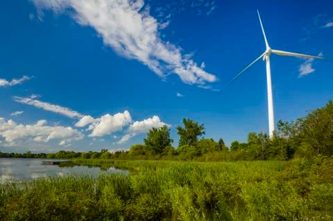 Wind power generating stations in the park Stock Photos